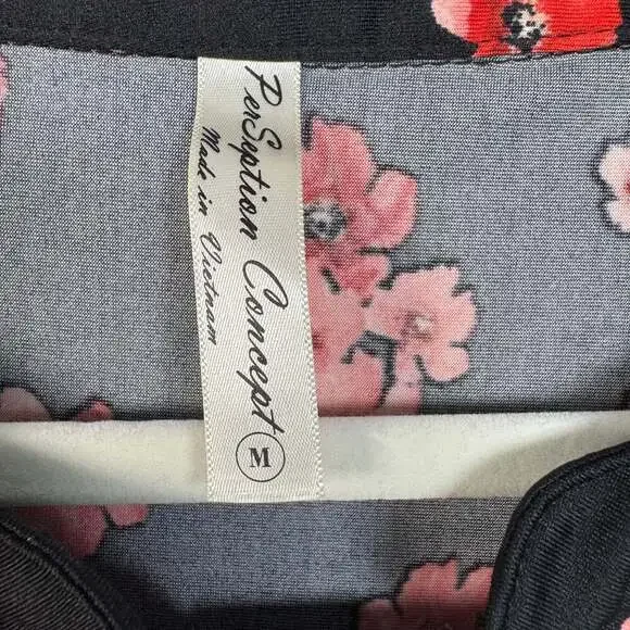 Perception Concept Floral Sleeveless Blouse with Ruffled Neck - Picture 5 of 7